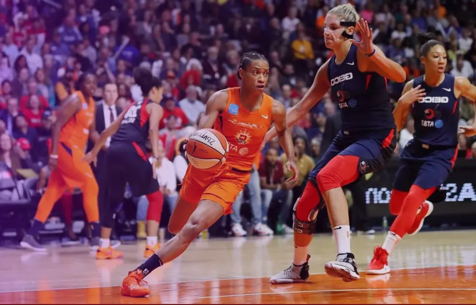 Women's basketball game in action.